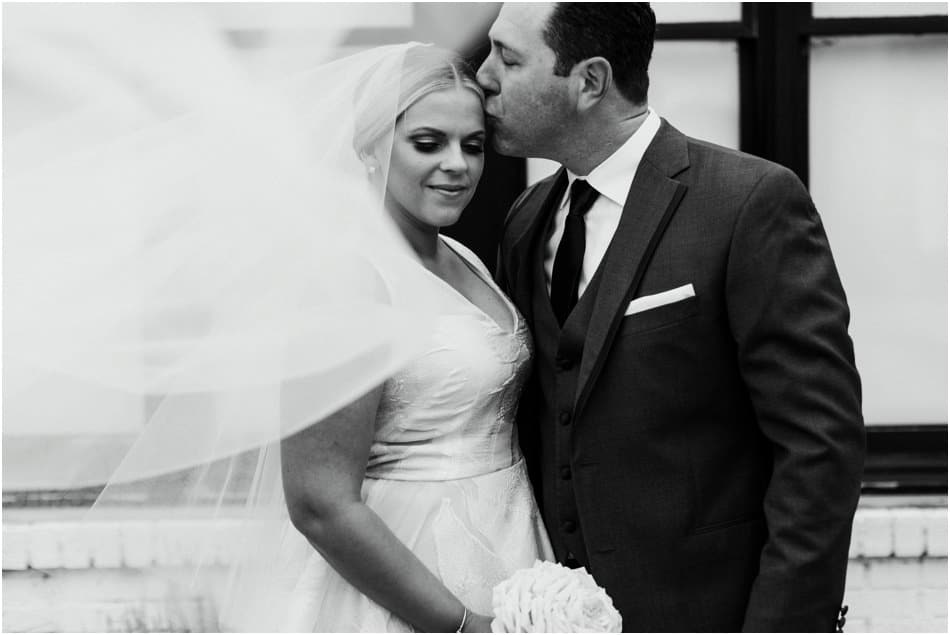 Aria Wedding in Minneapolis, MN with hanging chandeliers and flowers