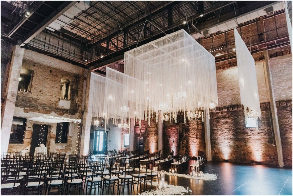 Aria Wedding in Minneapolis, MN with hanging chandeliers and flowers