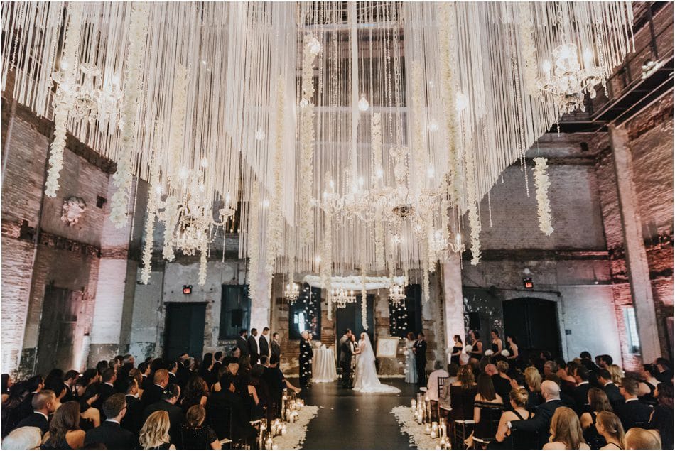 Aria Wedding in Minneapolis, MN with hanging chandeliers and flowers