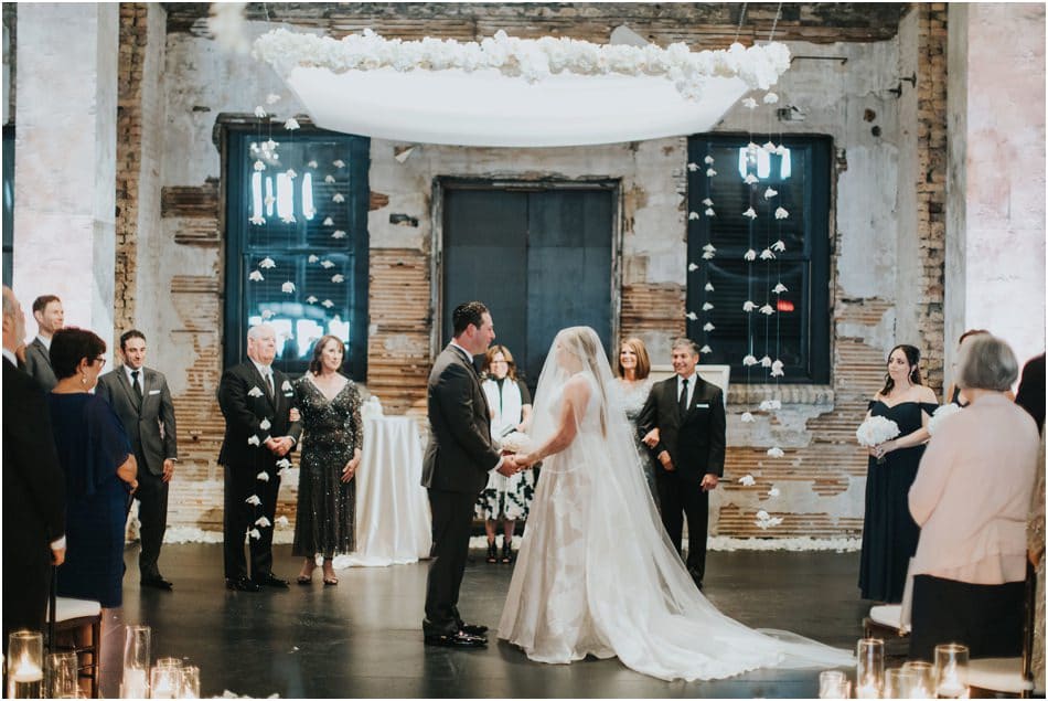 Aria Wedding in Minneapolis, MN with hanging chandeliers and flowers