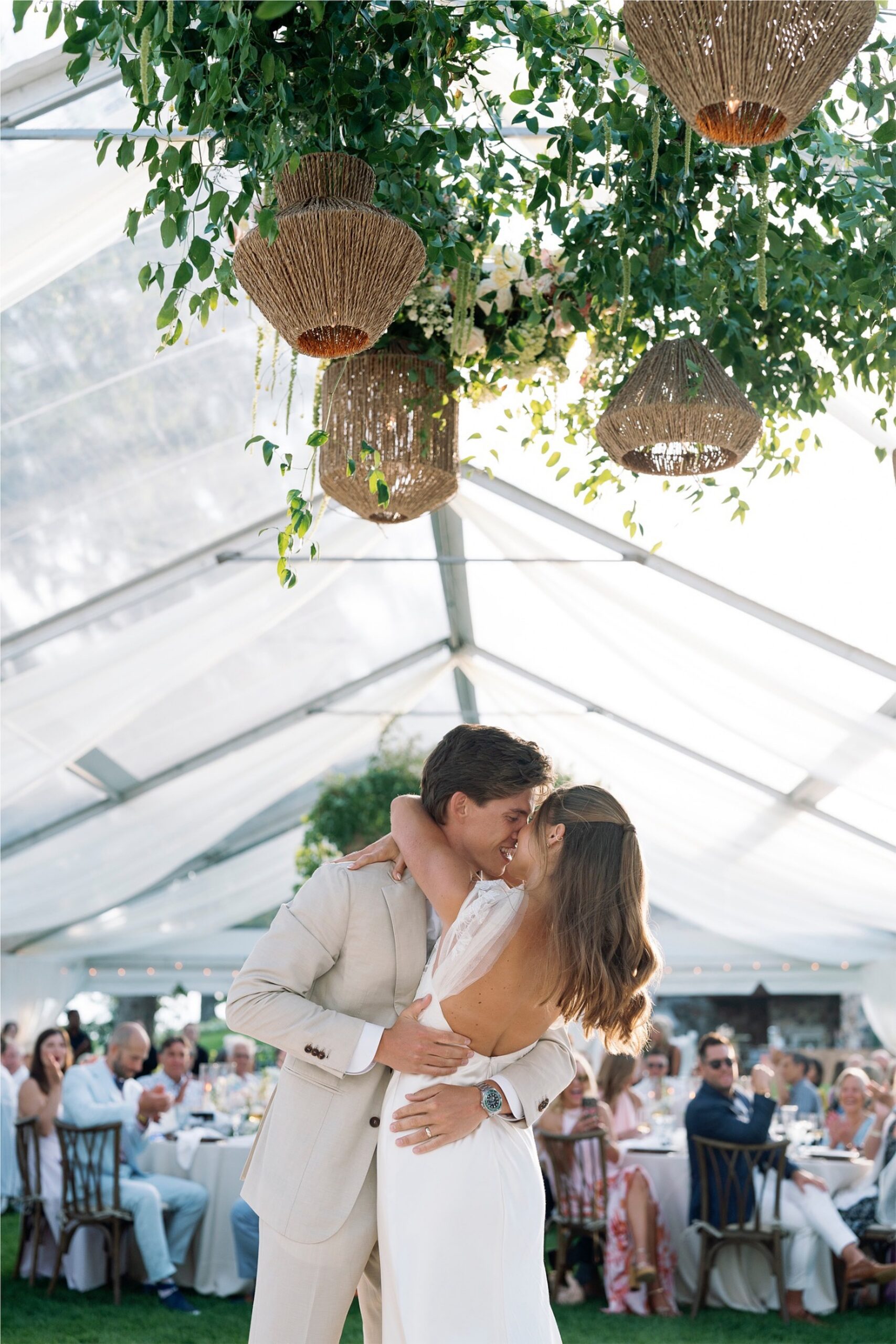 lake-minnetonka-summer-wedding-first-dance-under-floral-installation